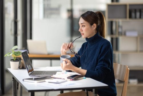 Young professional works at desk